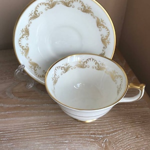 Vintage Aynsley White and Gold Teacup and Saucer. Made in England. Bone China