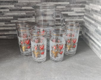 Glass Jug / Pitcher and 6 matching glasses