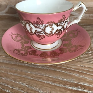 Tasse à thé et soucoupe Aynsley rose et or vintage. Fabriqué en Angleterre. Porcelaine