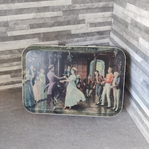Vintage Thorne&#39;s Toffee Tin featuring a couple dancing
