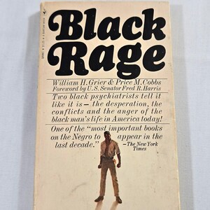 May include: A vintage paperback book titled "Black Rage" with bold black lettering. The cover features a photograph of a man and text describing the book's content and a quote from The New York Times.