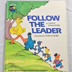 Vintage 80's Sesame Street Book "Follow The Leader" by Sandy Damashek, Illustrated by Tom Cooke.