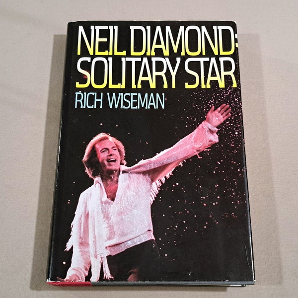 Vintage 80's First Edition Music Biography, "Neil Diamond: Solitary Star" written by Rich Wiseman, 1987.