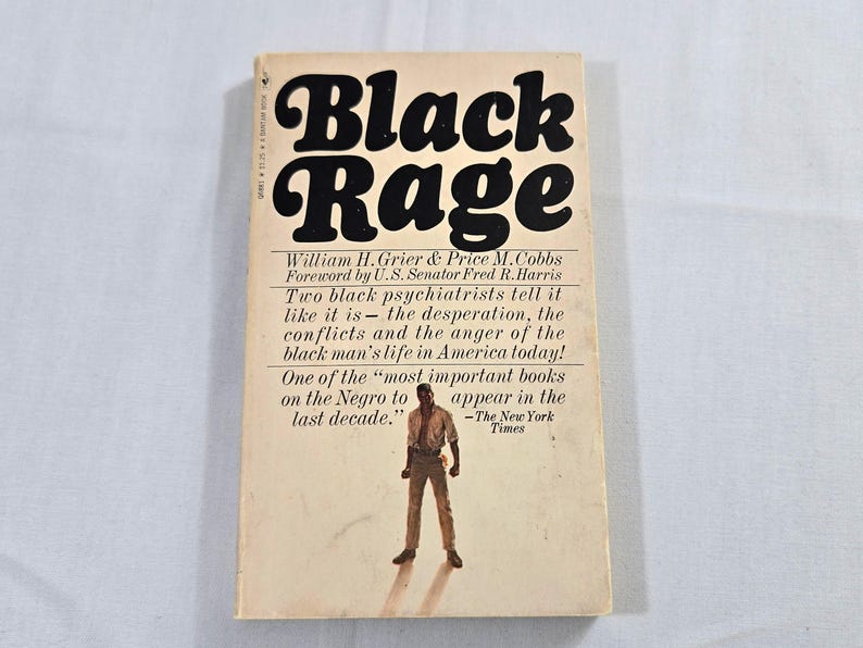 May include: A vintage paperback book titled "Black Rage" with bold black lettering. The cover features a photograph of a man and text describing the book's content and a quote from The New York Times.