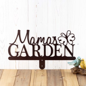 Personalized metal garden sign with first name and butterfly, in copper vein powder coat.