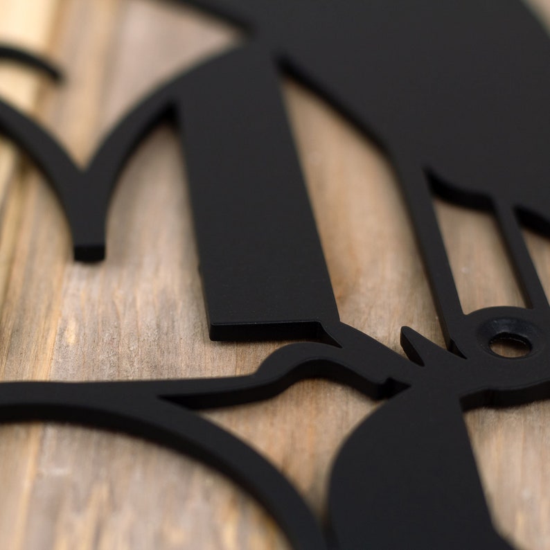 Close up of matte black powder coat on our modern house name sign.