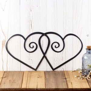 Hearts metal wall decor, in silver vein powder coat.