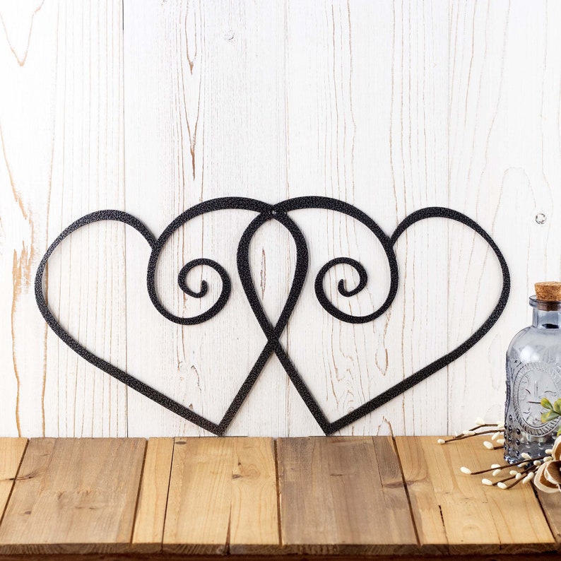 Hearts metal wall decor, in silver vein powder coat.