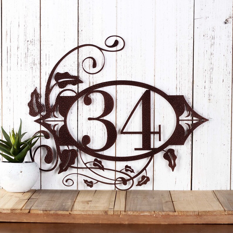 2 digit metal house number plaque with fleur de lis and vines, in copper vein powder coat.