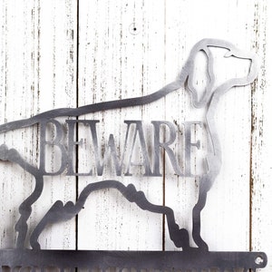 Close up of English Setter dog silhouette, with Beware, on our English Setters Live Here metal sign, in raw steel.