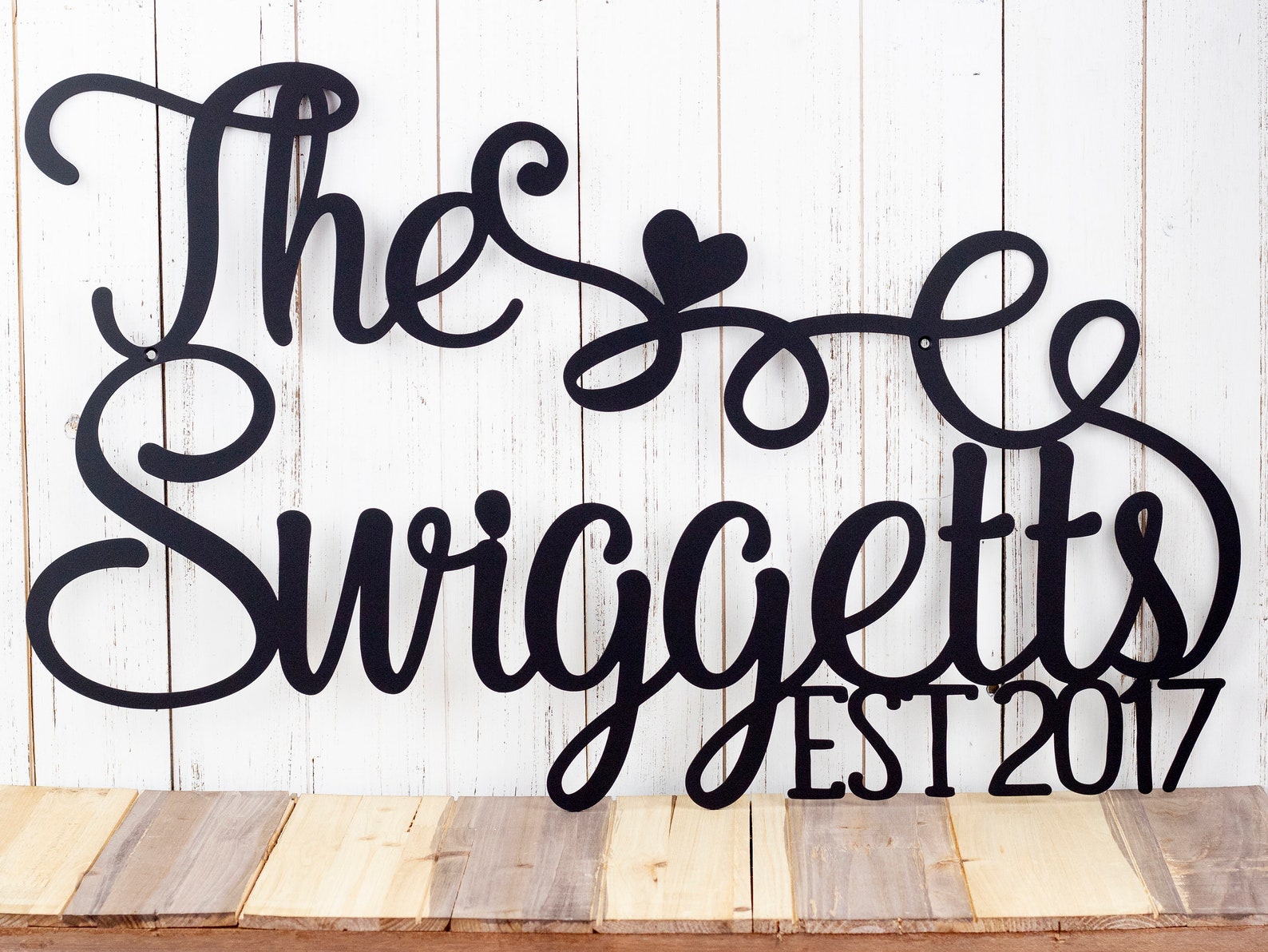 Вывеска с подписью. Up the establishment’ sign. Family name name. Family name name. Family name.