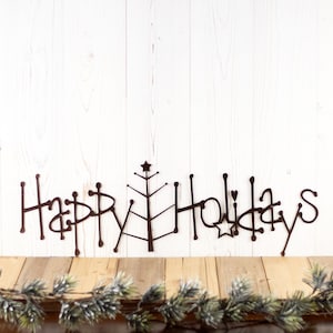 Happy Holidays metal wall art with Christmas tree, in copper vein powder coat.