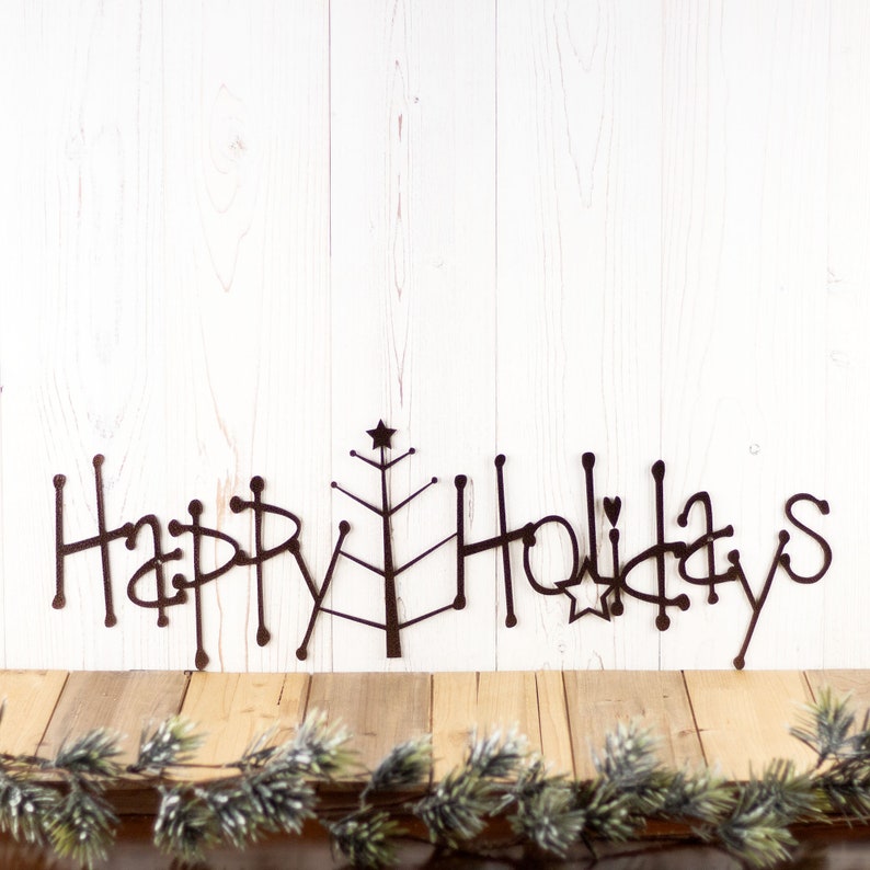 Happy Holidays metal wall art with Christmas tree, in copper vein powder coat.