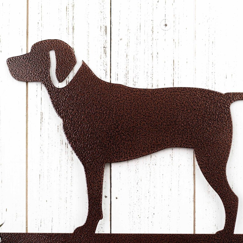 Close up of Labrador silhouette on our metal dog sign, in copper vein powder coat.