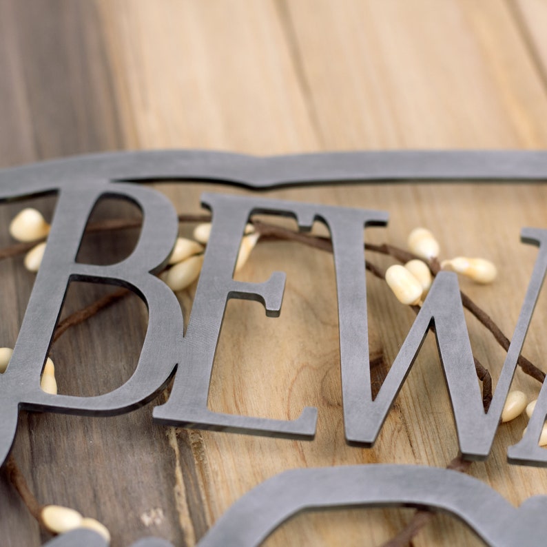 Close up of raw steel on our English Setter metal wall art.
