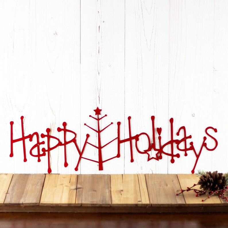 Happy Holidays metal wall art with Christmas tree, in red powder coat.