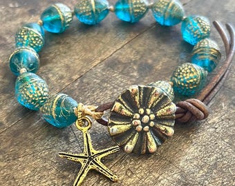 Bracelet étoiles de mer en or bleu turquoise