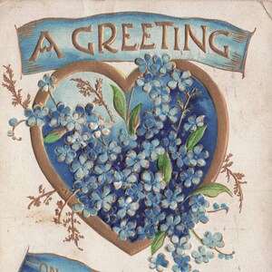 Carte Postale d’Anniversaire Antique 1909 – Bouquet de Myosotis en Cœur avec Ruban Bleu