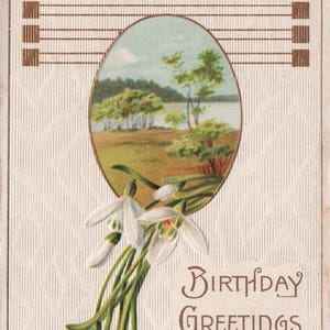 Carte postale ancienne 1910 – Vœux d'anniversaire avec perce-neige et paysage lacustre
