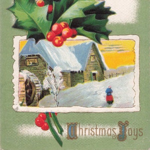 Noël : carte postale vintage « Christmas Joys » - Baies de houx et scène de chalet enneigé - Voeux de Noël en relief