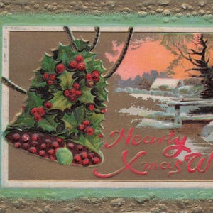 Natale: Antica cartolina di Natale in rilievo – "Auguri di Natale calorosi" (1912)