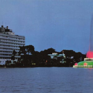 Florida: Lake Eola & Cherry Plaza Hotel, Orlando Florida – 1959 Night View Postcard