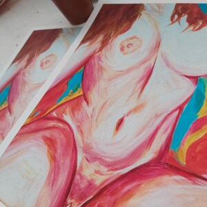 May include: A painting of a nude figure with a pink and red color scheme. The figure is sitting with their legs crossed and their arms are outstretched. The background is a vibrant blue and yellow.