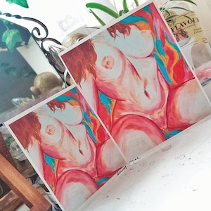 May include: Two paintings of a nude figure with a colorful background. The figure is painted in a realistic style with soft, blended colors. The background is a mix of bright, abstract shapes.