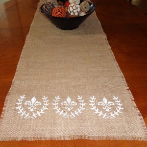 Fleur-de-lis krans jute tafelloper
