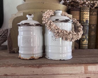 Antique French enamelware canisters