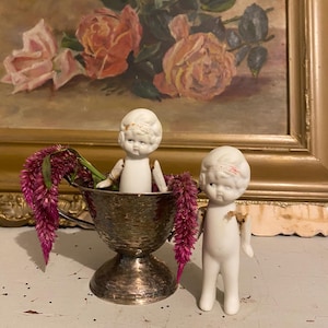 Vintage tiny porcelain dolls