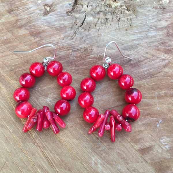 Dorothy, Natural red coral pieces and red coral round beaded earrings on silver french hooks