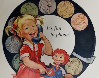 May include: A vintage illustration of a young girl talking on a rotary phone with a red-haired doll sitting beside her. The image is surrounded by a circle of smaller images of people talking on the phone. The text "It's fun to phone!" is written in large letters at the top of the image. The text "Bell Telephone System Working Together to Bring People Together" is written at the bottom of the image.