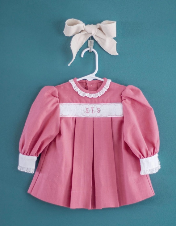 Sweet monogrammed vintage baby dress with matching bonnet.   Will change monogram to suit. Handmade and smocked.  Size 1.