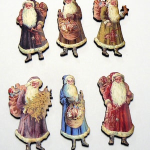 6 recortes de madeira de Papai Noel e Papai Noel em estilo vintage.