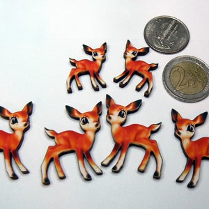 4 larger and 2 small fawns wood cut outs