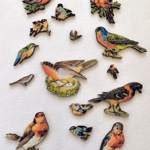 Houten gestanste vintage vogels