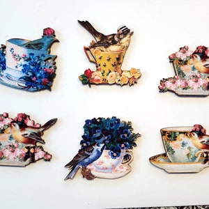 Vogels in theekopjes Houtsnedes