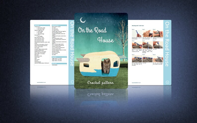 May include: Crochet pattern for a vintage camper van shaped cat house. The pattern includes instructions for crocheting the house, as well as a photo of a gray cat sitting inside the finished house.