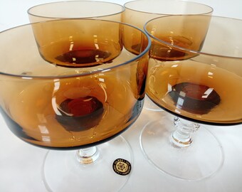 Mid Century Sasaki Regency Amber Stemware. Sold in sets of 6 Water Goblets,  3 Ice Tea Glasses, or 4 Sherbet / Champagne Glasses.