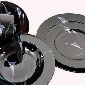 Mikasa Galleria Opus Black five piece place setting. Mystical Calla Lilys on black dinner plate, salad plate, soup bowl, cup and saucers.
