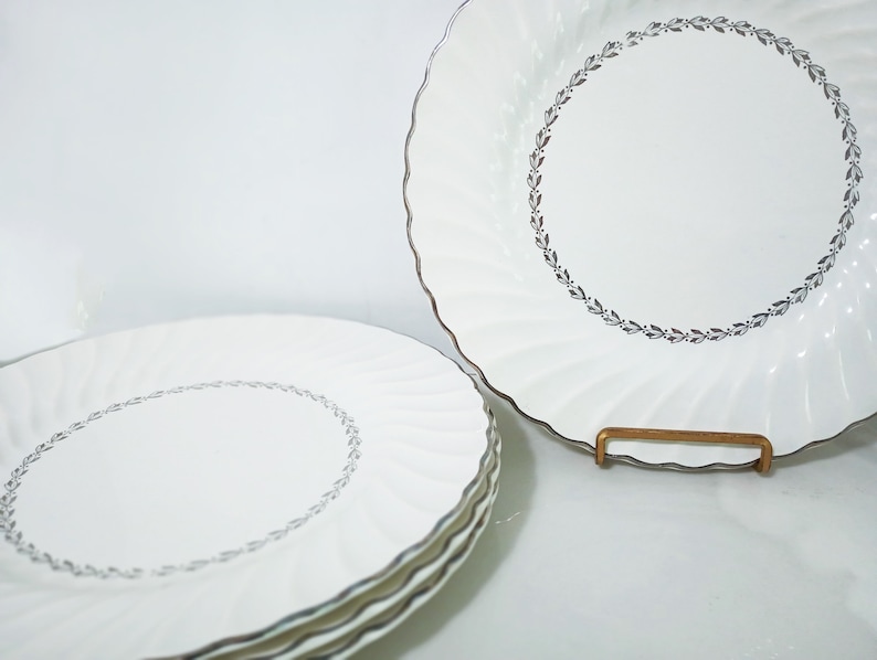 Mid Century Homer Laughlin Arcadia Dinnerware. Silver Platinum wreath of leaves around inner circle, Platinum trim on scalloped rimmed white china dinner plates