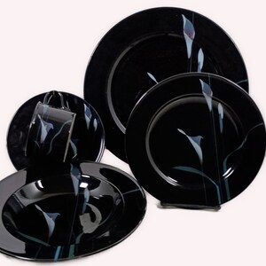 Mikasa Galleria Opus Black five piece place setting. Mystical Calla Lilys on black dinner plate, salad plate, soup bowl, cup and saucers.