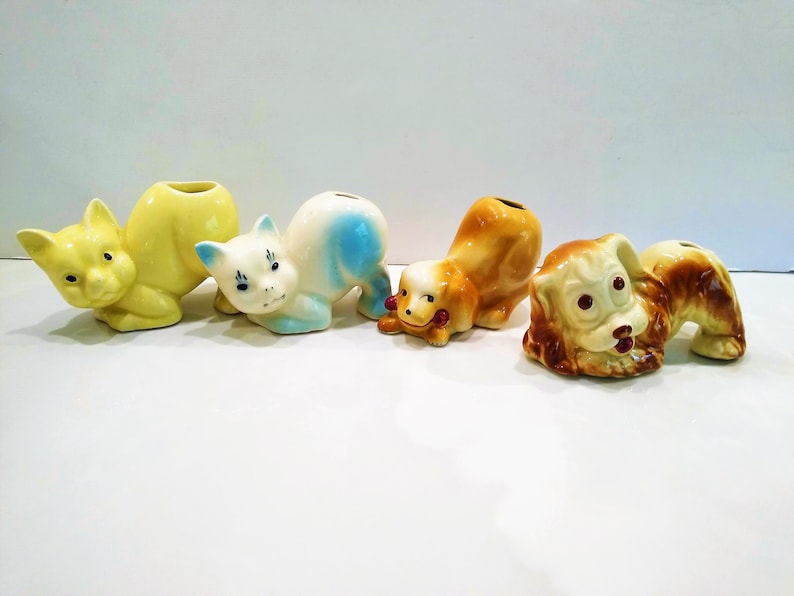Antique Dog and Cat Figurine Perfume Diffusers.  Yellow Diffuser Cat, Blue Diffuser Cat, Furry Diffuser Dog or Short Haired Diffuser Dog. Sometimes listed as Antique Toothbrush Holders or Toothpick holders