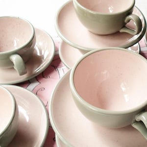 Harkerware Oven Proof Shell pink dinnerware pieces. Shell pink with dove gray undersides. Mid Century Modern plates, cups and saucers sold in sets.