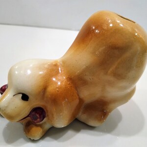 Antique short haired Dog Figurine Perfume Diffusers. Sometimes listed as Antique Toothbrush or toothpick Holder, however it was likely originally made as perfume diffusers