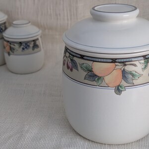 Mikasa Garden Harvest CAC29 stoneware Large canister  with fruit and leaf border on cream glaze.
