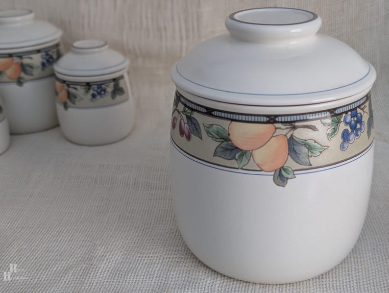 Mikasa Garden Harvest CAC29 stoneware Large canister  with fruit and leaf border on cream glaze.