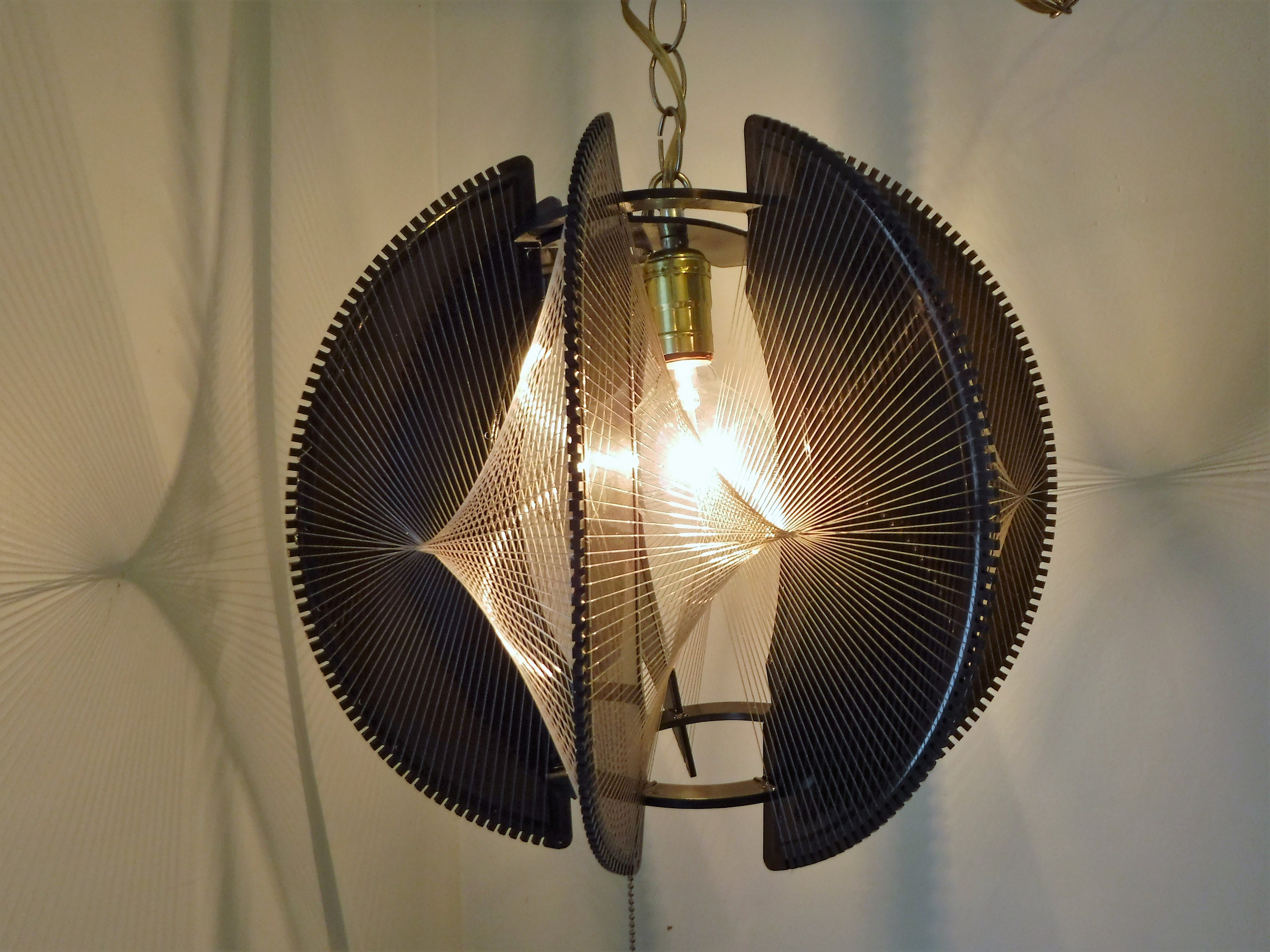 Mid century modern swag light discount