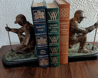 Vintage Bronze Sculpture  Golfer Bookends. Matched pair of Golfers Intently Reading the Green.